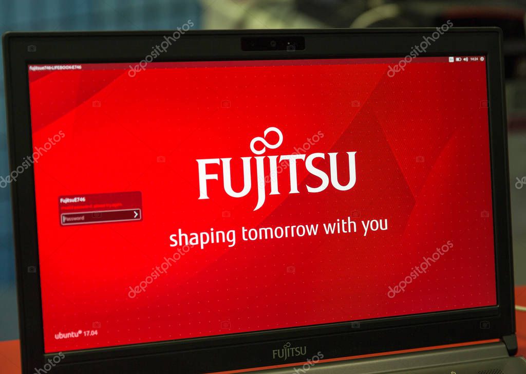 KIEV, UKRAINE - OCTOBER 07, 2017: Logo Fujitsu closeup, a Japanese multinational information technology equipment and services company booth at CEE 2017, electronics trade show in KyivExpoPlaza EC.