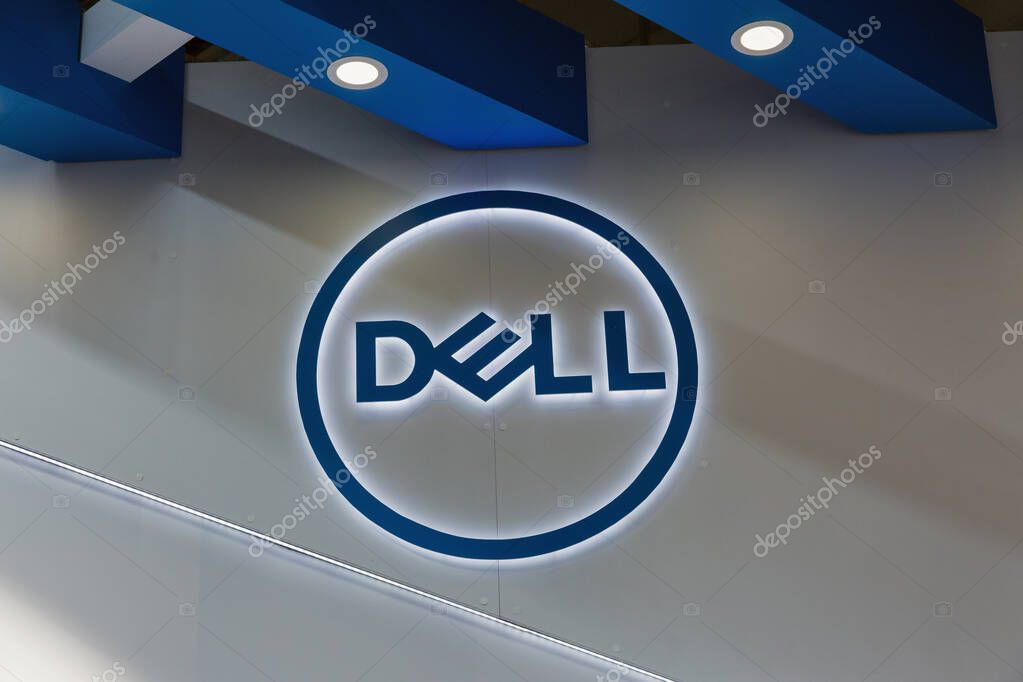 KYIV, UKRAINE - APRIL 06, 2019: Dell, American multinational computer technology company that develops, sells, repairs, and supports computers logo illuminated closeup on booth during CEE 2019 show.
