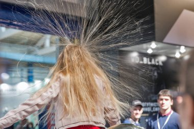 Standing hair from static electricity. Dell booth, CEE 2019, Kyiv, Ukraine.