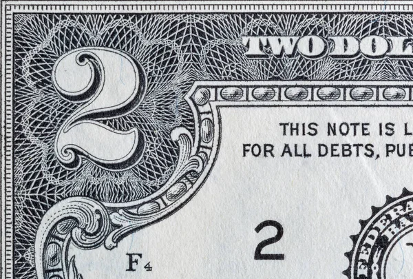 Corner of US two dollar bill macro. — Zdjęcie stockowe