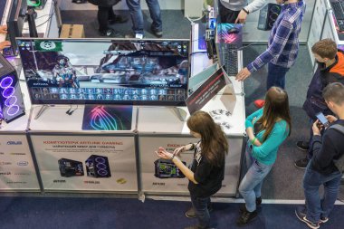 KYIV, UKRAINE - APRIL 13, 2019: People visit CEE 2019, the largest electronics trade show of Ukraine in Tetra Pack EC. View from above.