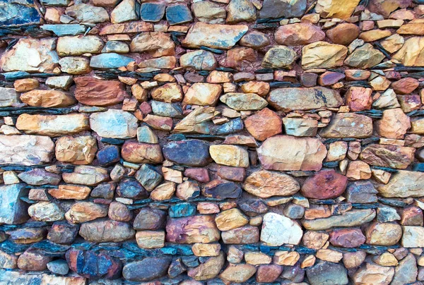 Rödaktig stenmur — Stockfoto