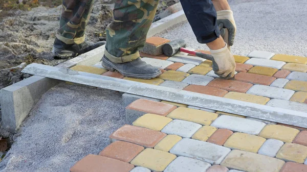 Laying Paving Slabs by mosaic close-up. Road Paving, constructio — Stock Image Laying Paving Slabs by mosaic close-up. Road Paving, constructio Royalty Free Stock Images