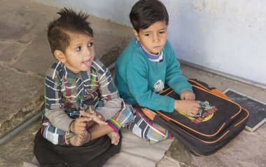 Rajasthan, India  2016. Indian schoolboys in class at lo clipart