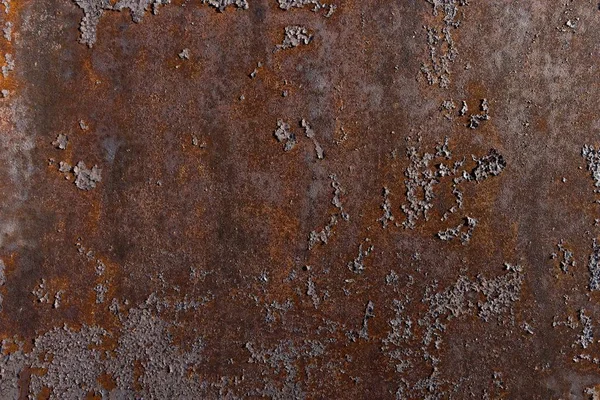 Boyanın soyulduğu metal levha, zamanın ve havanın etkilerinden dolayı aşınma sürecinden geçiyor. Eski endüstriyel doku