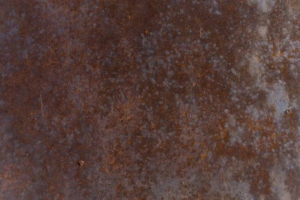 Metal levha, zamanın ve havanın etkilerinden dolayı aşınmaya maruz kalmış. Eski endüstriyel doku