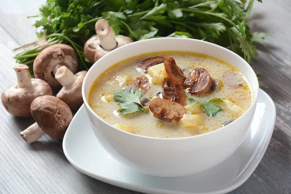 Delicious soup with mushrooms champignon and potato.Creamy Chanterelle Soup .Nordic cuisine. Vegan soup