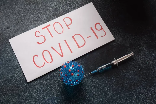 Vaccine for corona-virus 2019-nCoV. Photo of vaccine, medical injection and corona-virus.Stop corona-virus