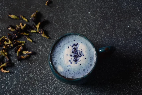 Healthy Blue Butterfly Pea Latte Tea from flowers Clitoria ternatea plant or Asian pigeon wings . Detox, antioxidant, anti-stress, anti- ageing beverage