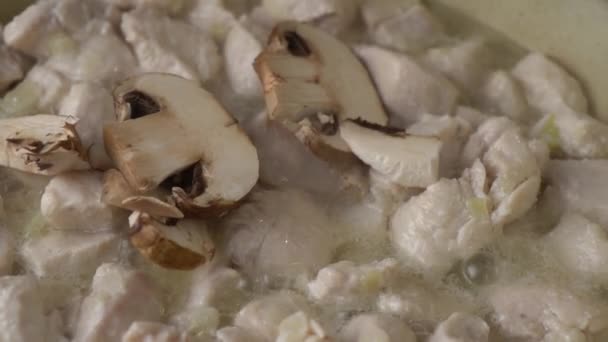 Fresh Mushrooms Being Added Frying Chicken Meat Boiling Oil — Stock Video