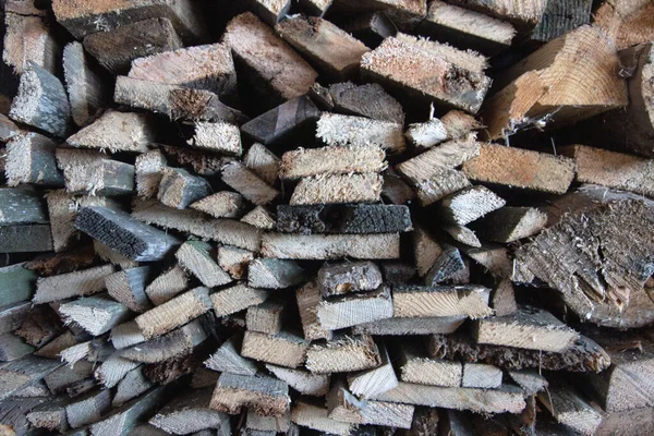 Pile or stack of natural firewood logs texture background. Abstract photo of natural wooden logs texture. — Stockfoto