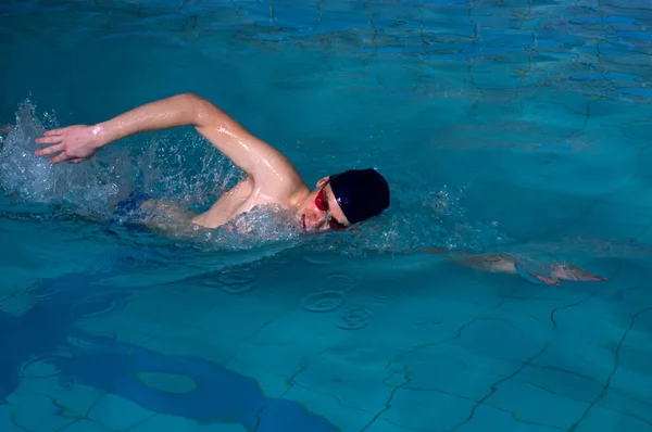 Man Swims Forward Crawl Style Swimming Pool Indoor — Stock Photo, Image