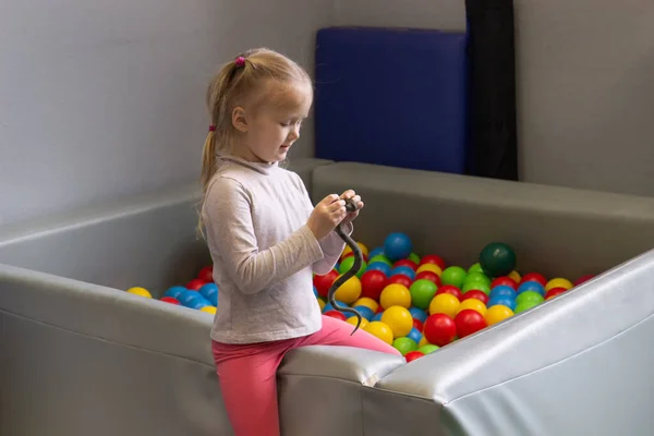 Little Girl Plays Room Sensory Integration Pool Balls Different Colors — Stock Photo, Image