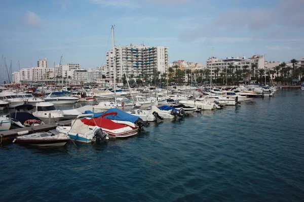 The port of Ibiza in Eivissa where boats and yachts are anchored in the Vip area of ​​the Balearic island in the blue water — стокове фото