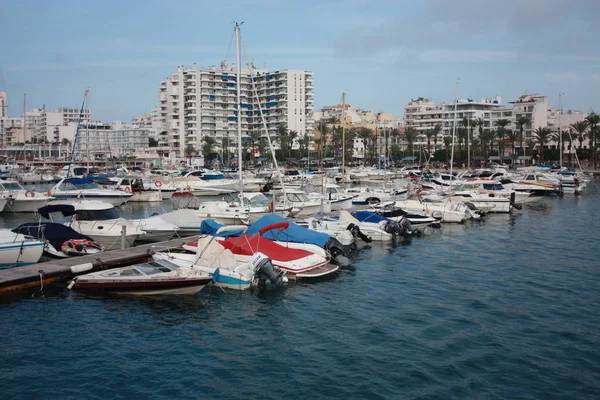 The port of Ibiza in Eivissa where boats and yachts are anchored in the Vip area of ​​the Balearic island in the blue water — стокове фото