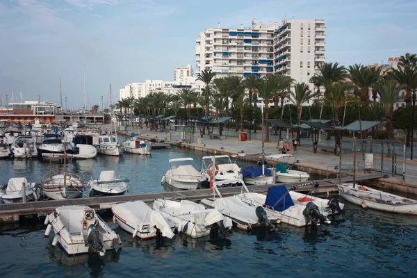 The port of Ibiza in Eivissa where boats and yachts are anchored in the VIP area of presidentthe Balearic island in the blue water — стоковое фото