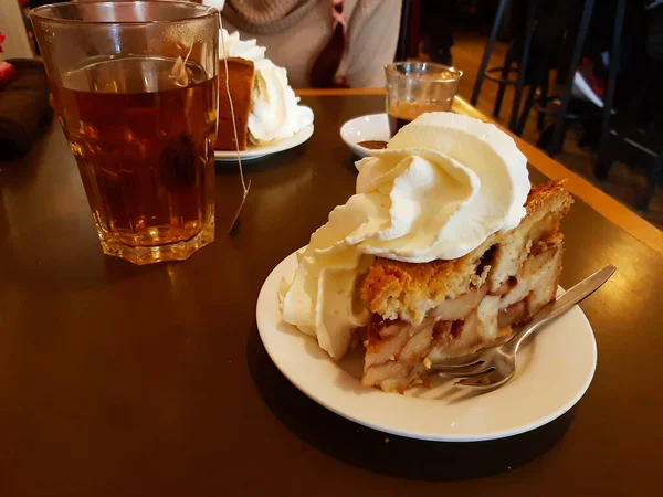 High Dutch Apple Pie Plenty Whipped Cream Brown Wooden Table — Stock Photo, Image