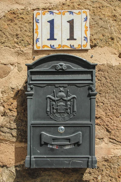 Old spanish styled letterbox on stone wall in Mallorca, Spain