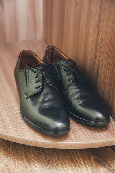 a pair of black men's shoes