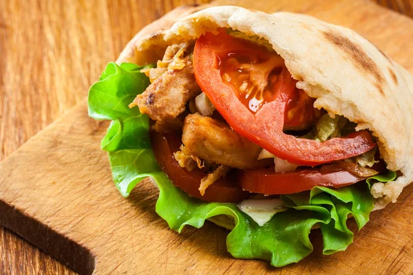 Doner kebab - fried chicken meat with vegetables — Stock Photo, Image
