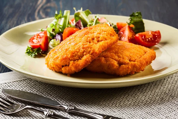 Cutlet Cordon Bleu with salad — Stock Photo, Image