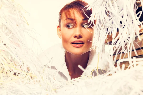 Ecology concept. Young woman with shredded paper. Focus on face — Stock Photo, Image