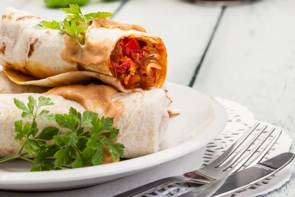 Mexican burritos wraps with mincemeat, beans and vegetables — Stock Photo, Image