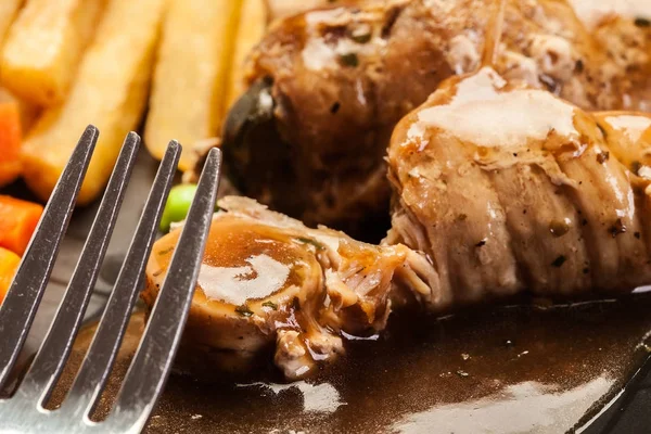 Pork rolls with french fries with vegetable — Stock Photo, Image