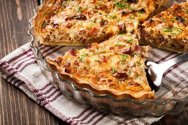 Pieces of quiche lorraine with bacon and cheese — Stock Photo, Image