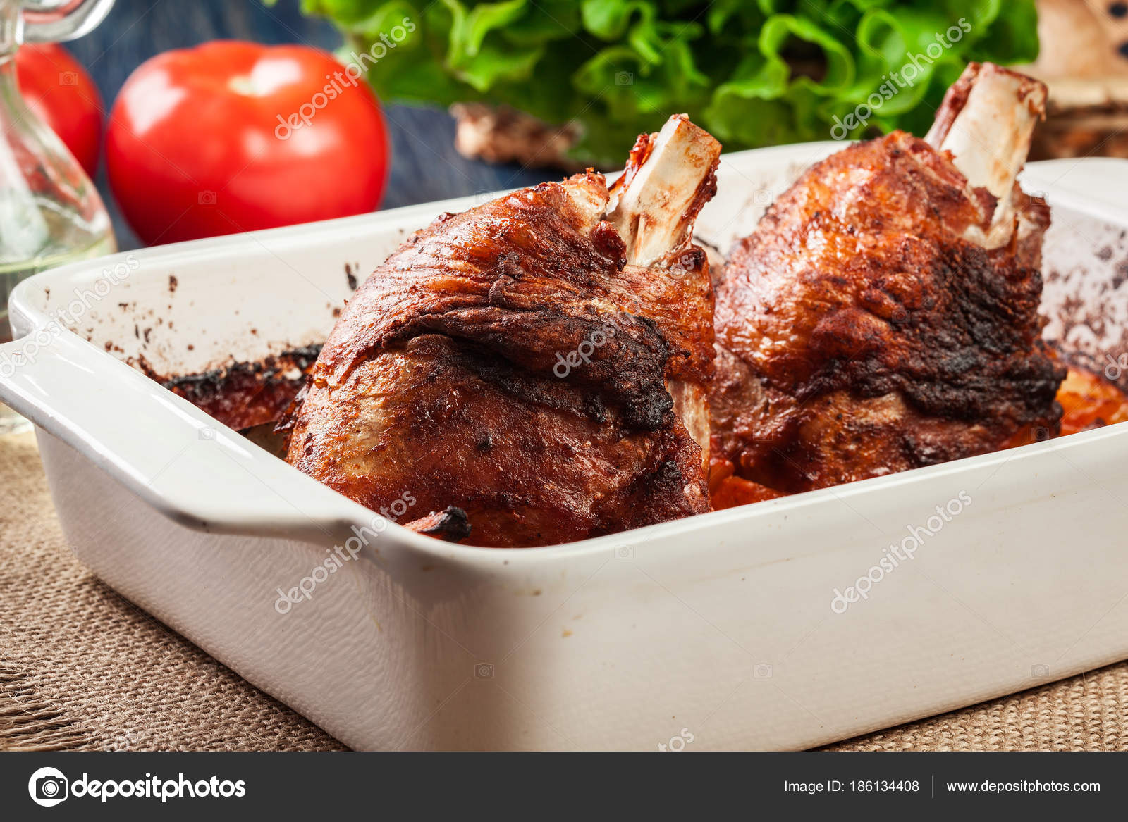 Roasted turkey knuckle with potatoes and vegetable Stock Photo by
