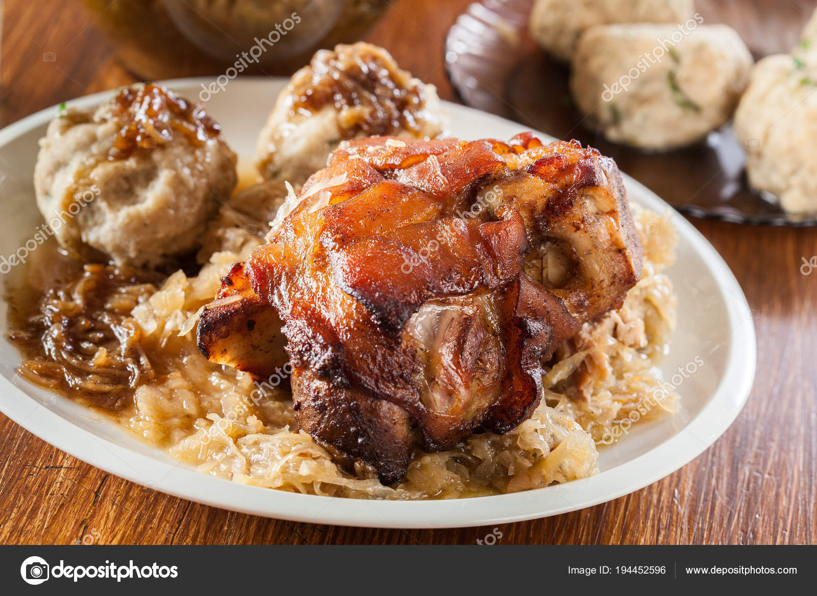 Pork knuckle with fried sauerkraut — Stock Photo © fotek 194452596