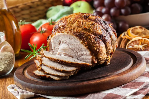 Baked pork ham on cutting board — Stock Photo, Image
