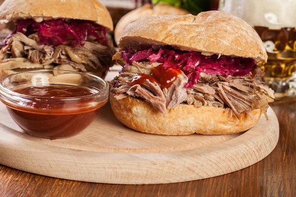 Pulled pork sandwich with red cabbage and bbq sauce