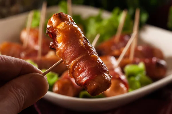 Pigs in blankets on a plate — Stock Photo, Image