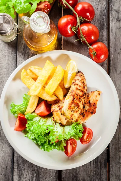 Grilled Chicken Breasts Served Fries Fresh Salad Plate — Stock Photo, Image