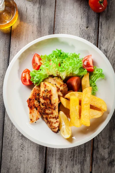 Grilled Chicken Breasts Served Fries Fresh Salad Plate — Stock Photo, Image