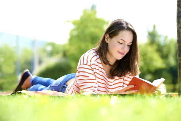 Young woman relaxing outdoor Royalty Free Stock Images