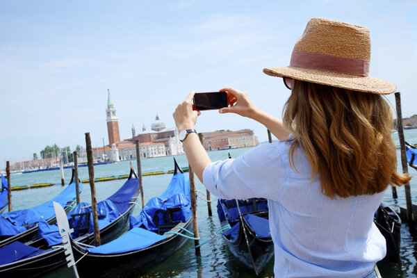  tourist with  phone capturing the moment 