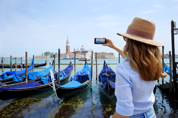  tourist with  phone capturing the moment 