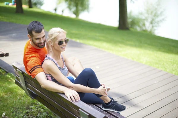 Couple relaxing after runnunig — Stockfoto