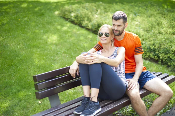 Couple relaxing after runnunig — Stockfoto