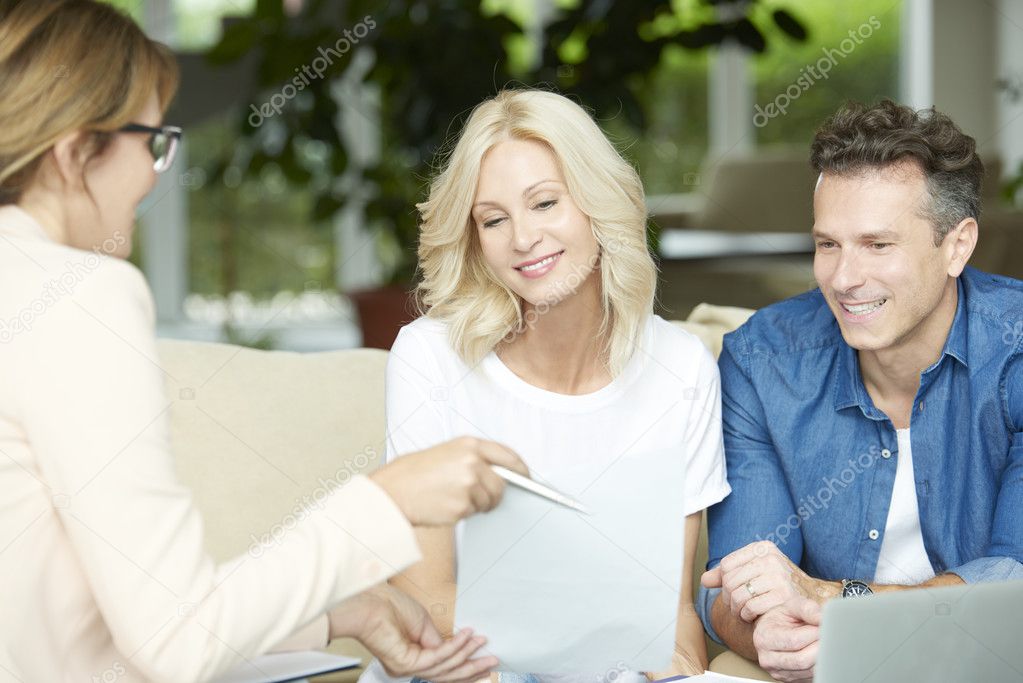  couple sitting at home and consulting