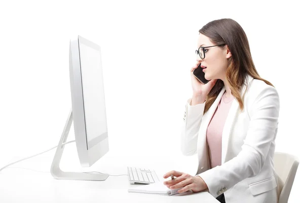 Creative woman sitting at desk — Stock Photo, Image