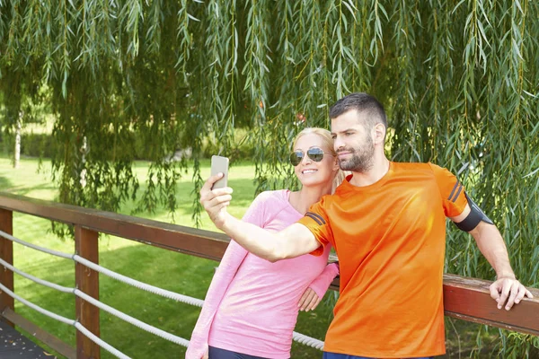 Runners taking selfie — Stock Photo, Image