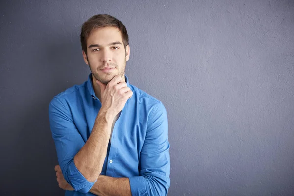 Handsome man looking at camera — Stock Photo, Image