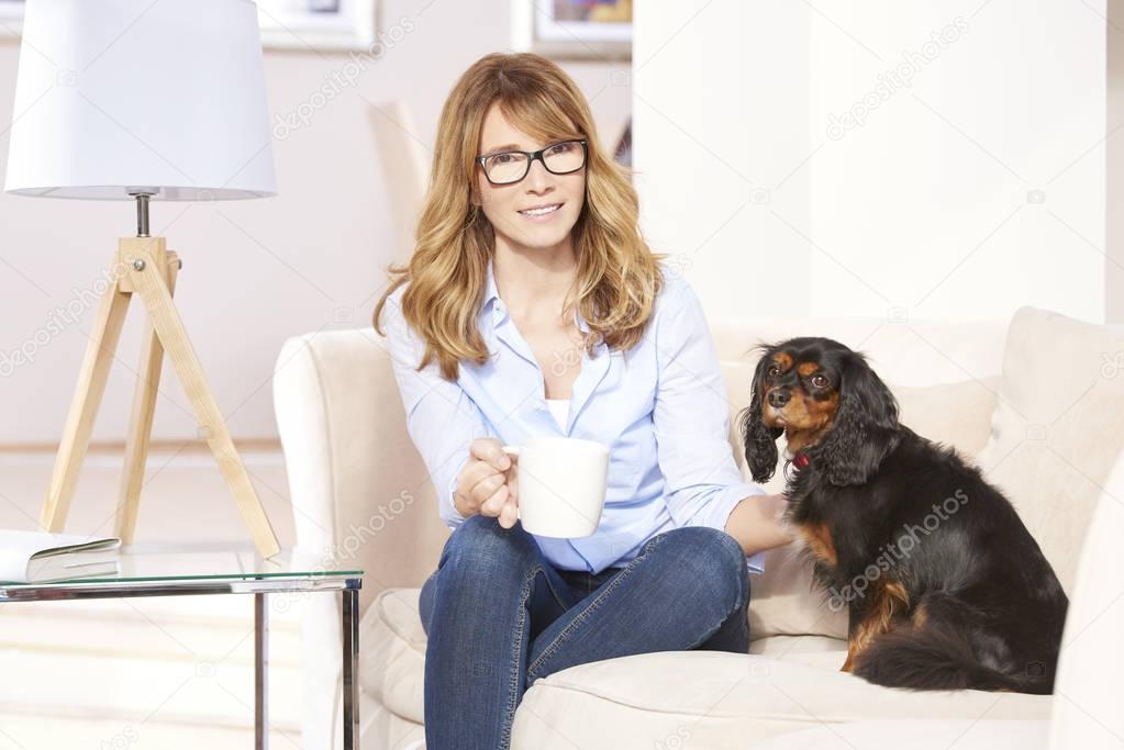 woman enjoying time with her pet