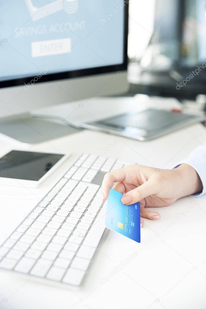  businesswoman holding bank card