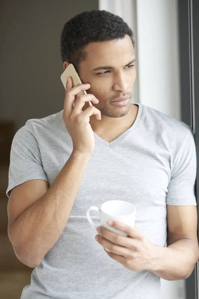 Man talking with somebody while standing — Stock Photo, Image