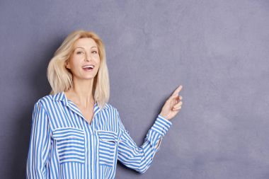  woman pointing at something interesting