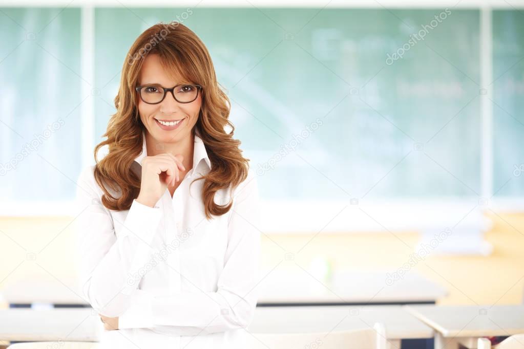  teacher standing in the classroom